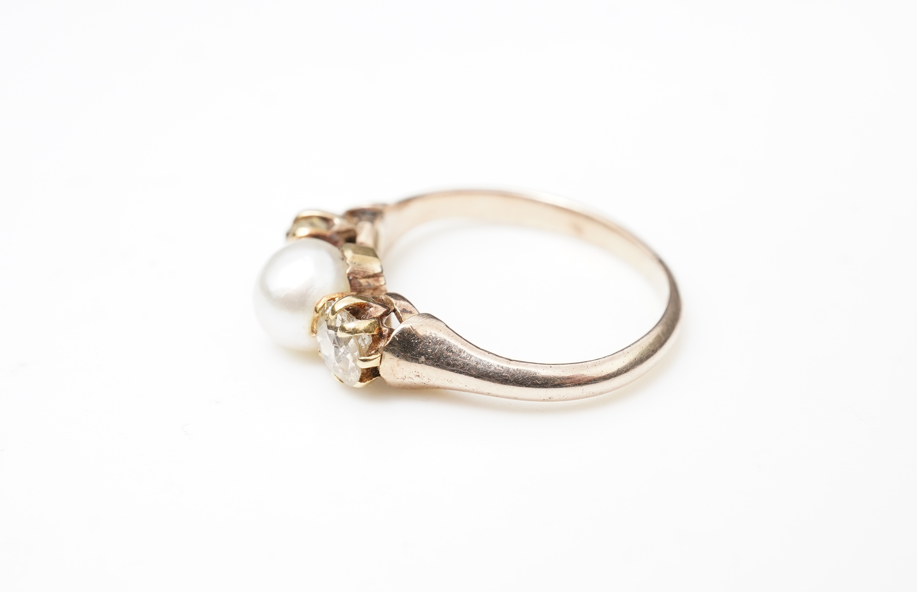 A late Victorian pearl and diamond ring, circa 1900